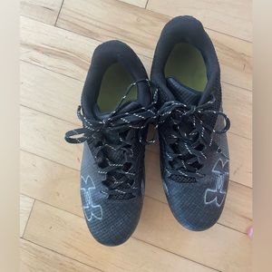 Under Armour football cleats.  Like new!